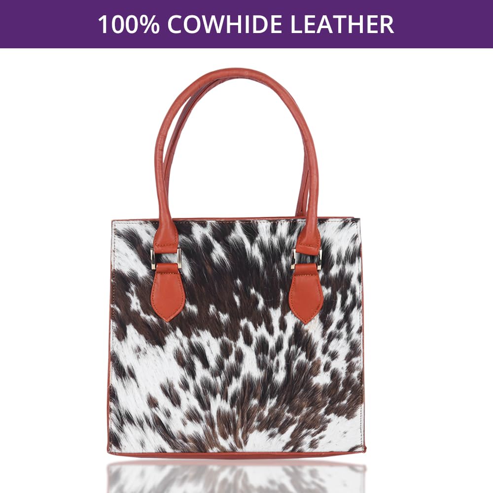 Cow print top handle handbag for women in premium quality.